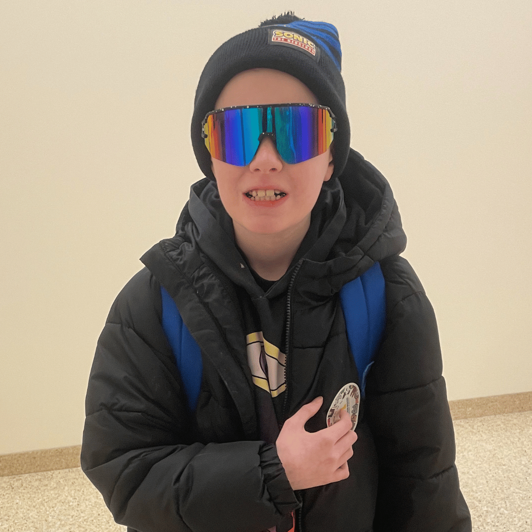 All-Star Bentley wearing big sunglasses and a stocking cap