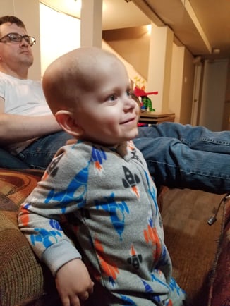 Evan onesie smiling