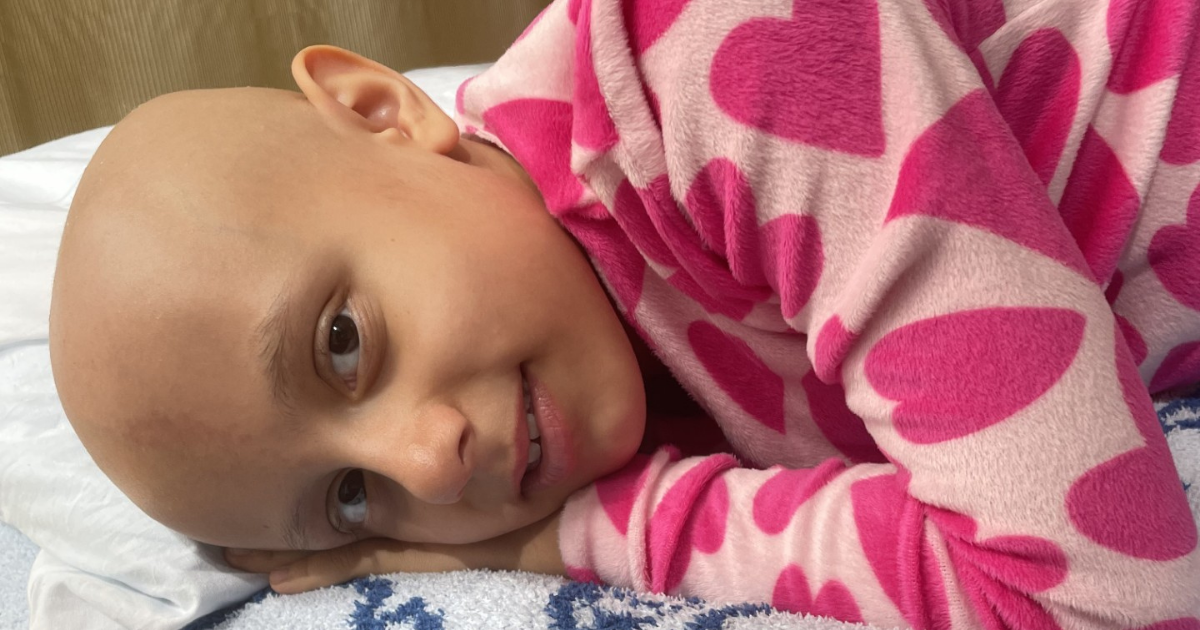 A girl who has faced cancer and been supported financially by Pinky Swear Foundation.