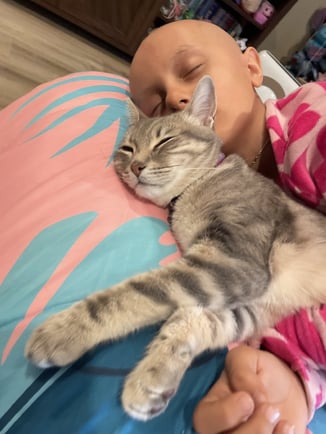 Mila and cat sleeping