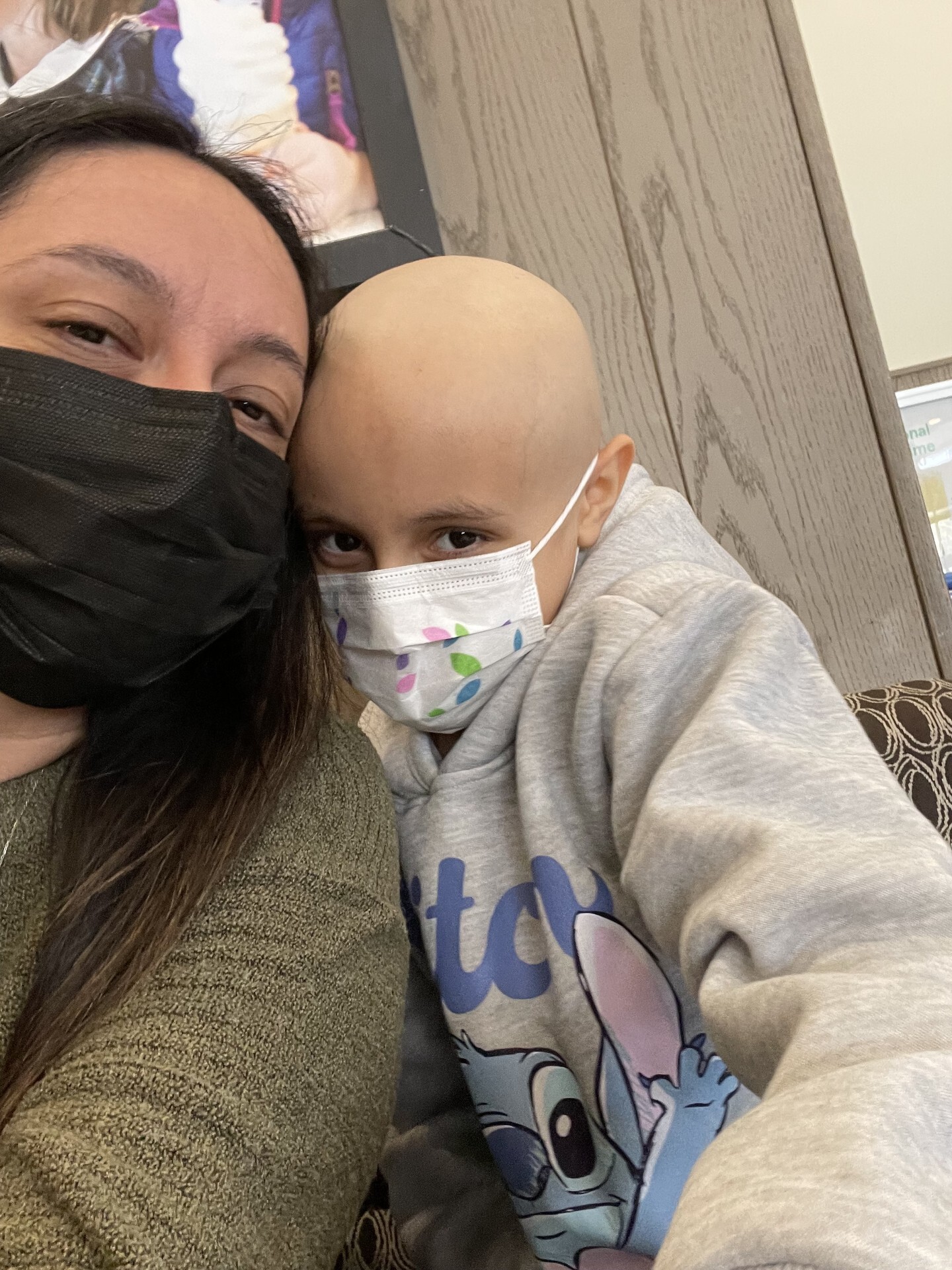 Mila and mom wearing masks