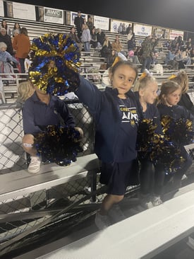 Mila cheerleading
