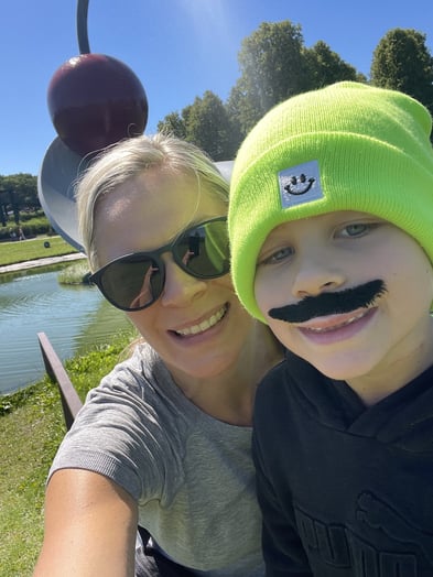 Ivan and mom close up outside fake moustache