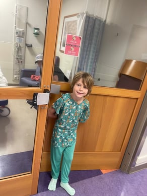 Ivan at door of hospital room