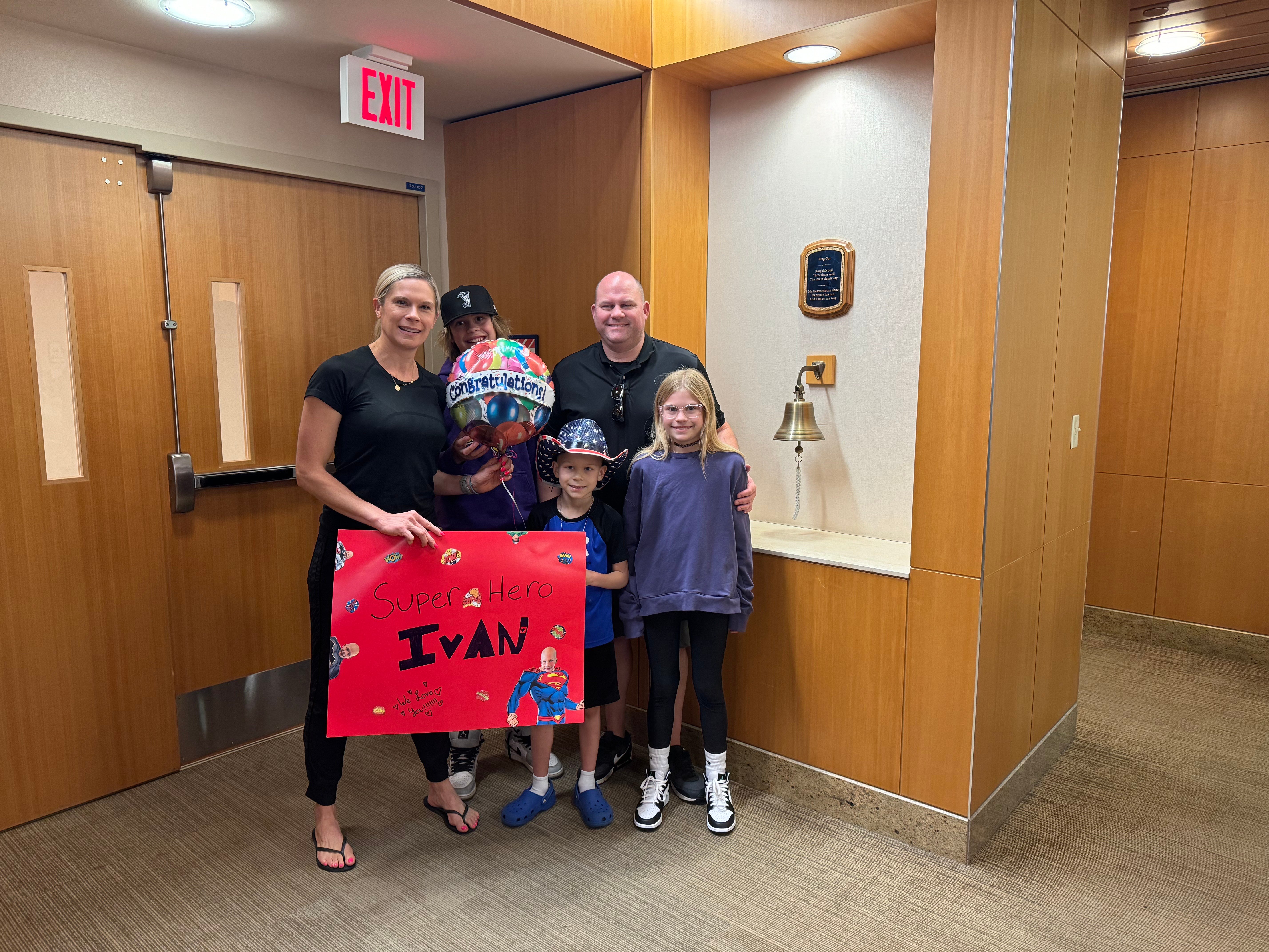 Ivan family with Super hero poster