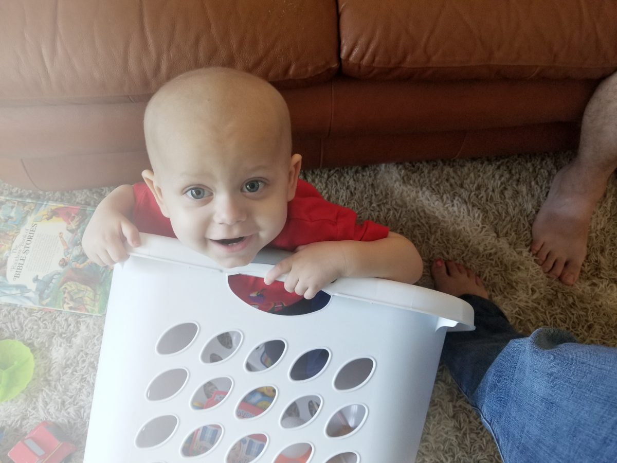All-Star Evan in a laundry basket