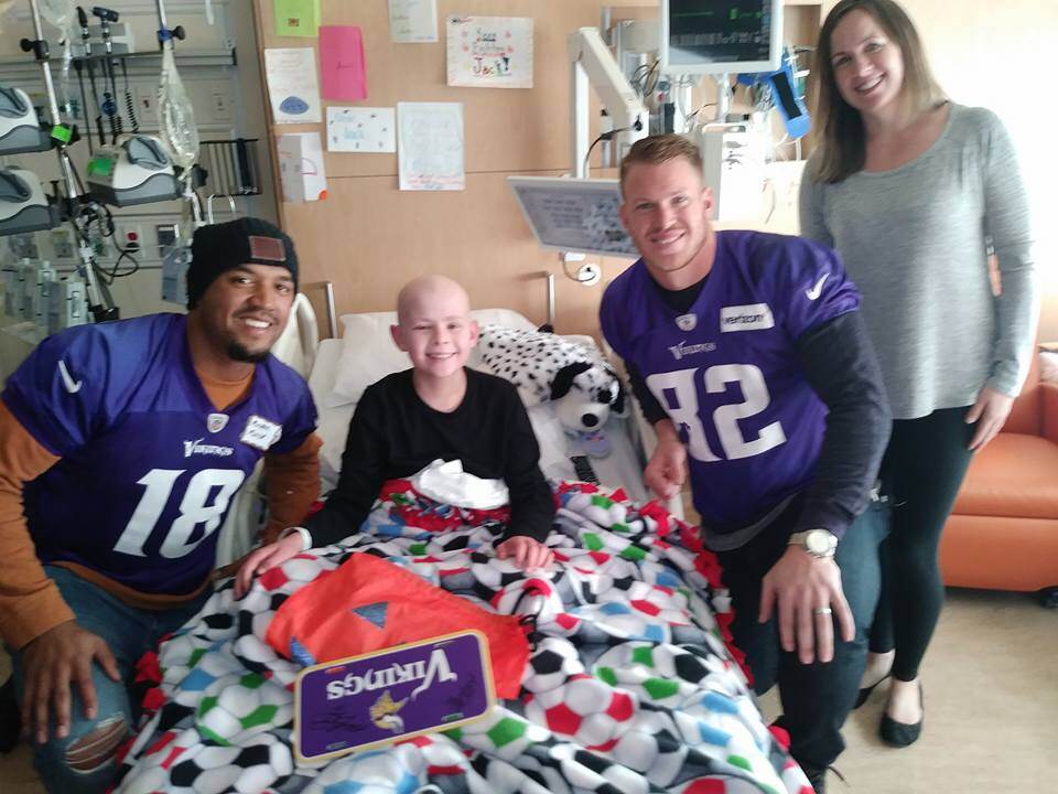 Jack with Vikings players