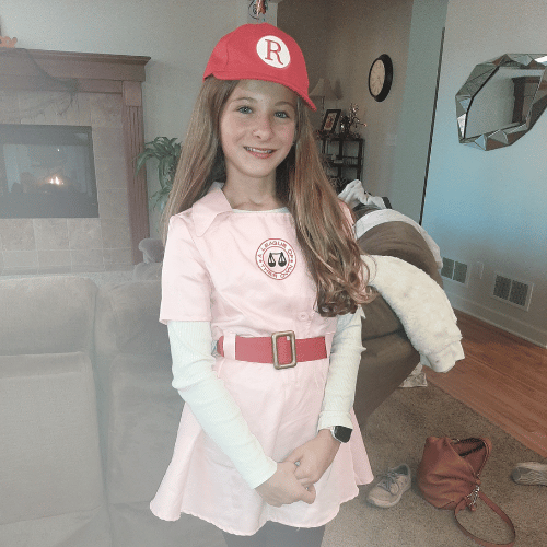 All-Star Maiya wearing a dress and baseball hat