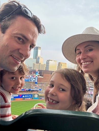 Adam and family at a Minnesota Twins game