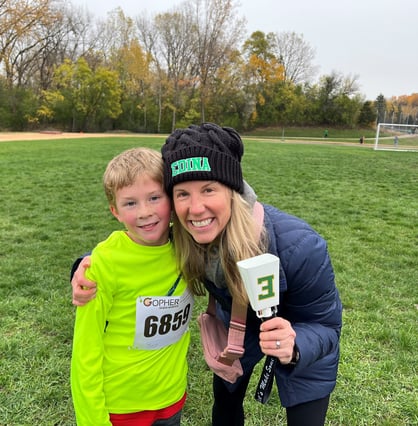 Executive Director Erica Campbell with her son Duncan at a race