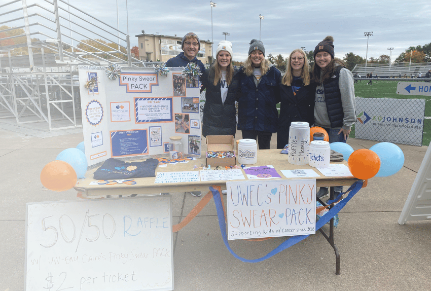 A group of college students raising money for Pinky Swear with a raffle