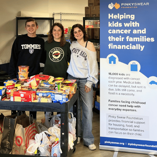 pantry donations and three people from the Pinky Swear Pack at St. Thomas University in St. Paul MN