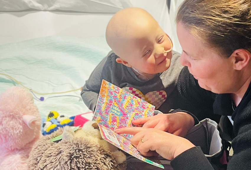 All-Star Kayla and her mom reading a story