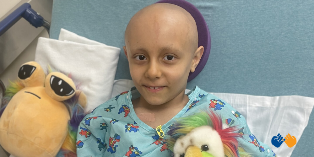 A little girl facing cancer who has received financial support from Pinky Swear Foundation