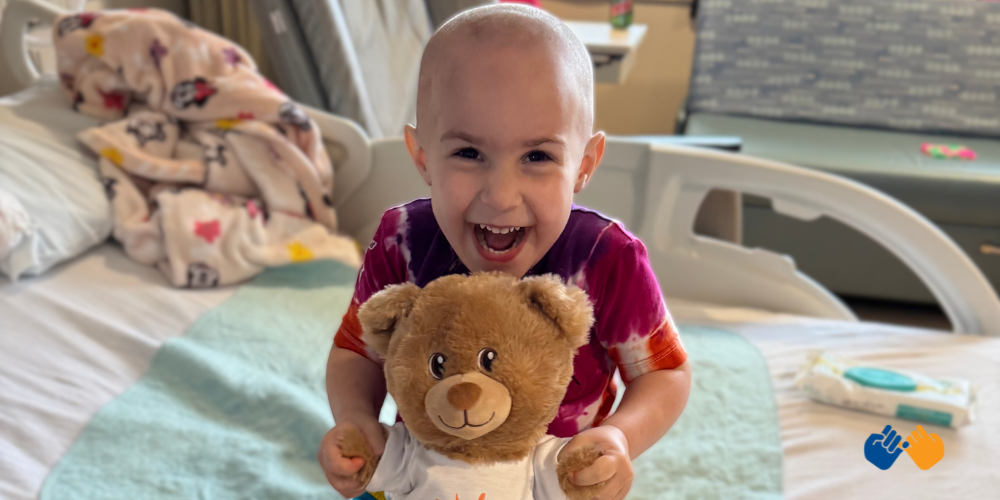 A little girl named Sophie who received support from Pinky Swear Foundation during her journey with acute myeloid leukemia